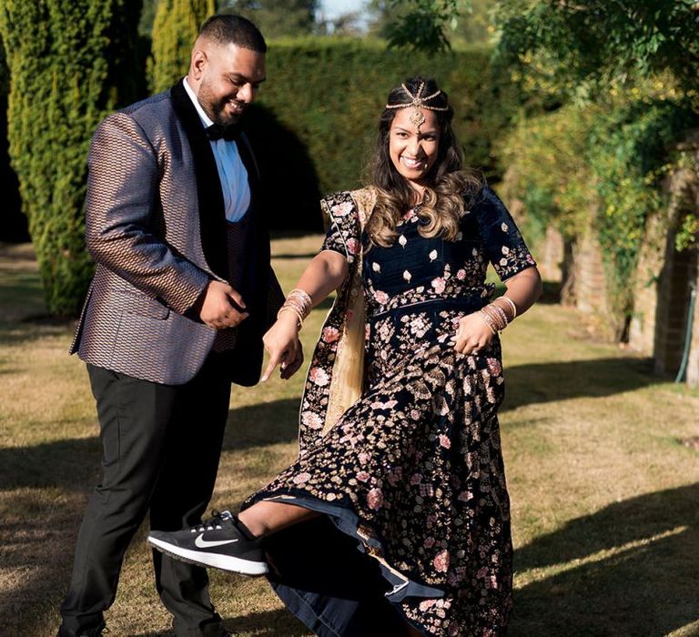 Bride-t-be wearing trainers under her sari at engagement session