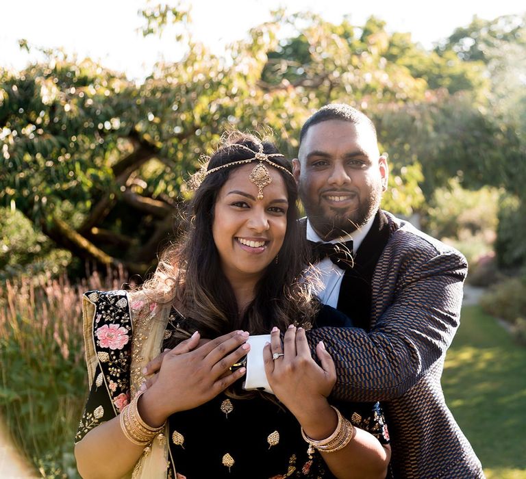 Bride and groom-to-be embracing at Engagement shoot