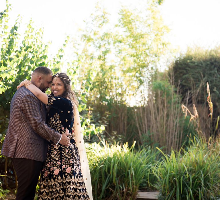 Indian bride and groom in traditional outfits at Engagement shoot