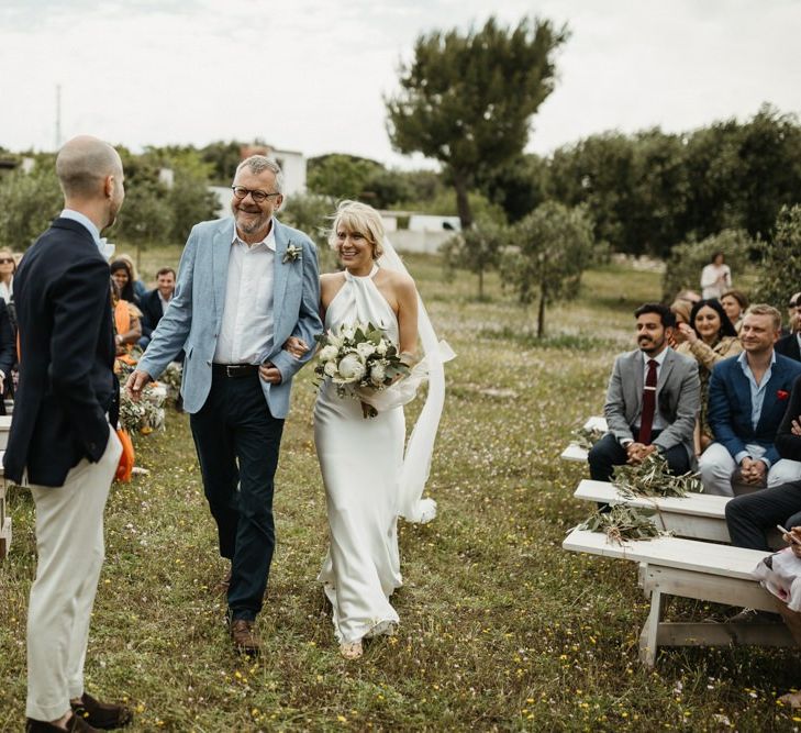 Bride and groom during outdoor ceremony at destination wedding