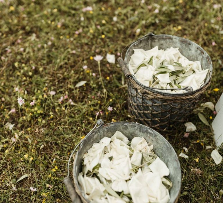 White petals in confetti basket