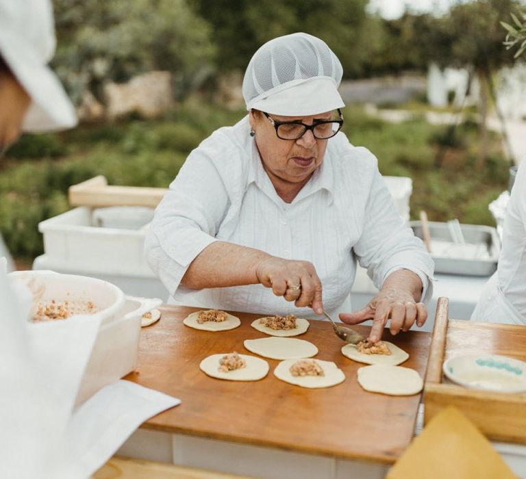 Chef prepares wedding food at Masseria Moroseta