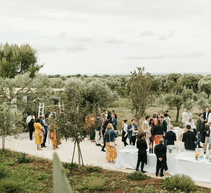 Guests enjoy drinks outside at Masseria Moroseta