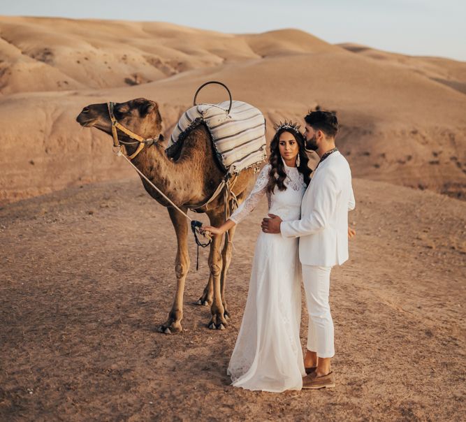 Moroccan desert wedding portrait with camel