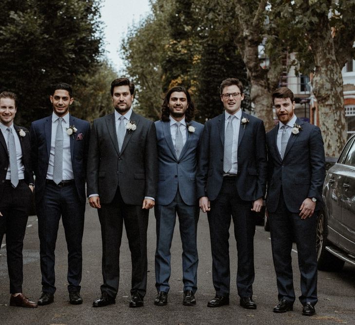 Groomsmen In Moss Bros. Suit // Image By Olivia &amp; Dan Photography