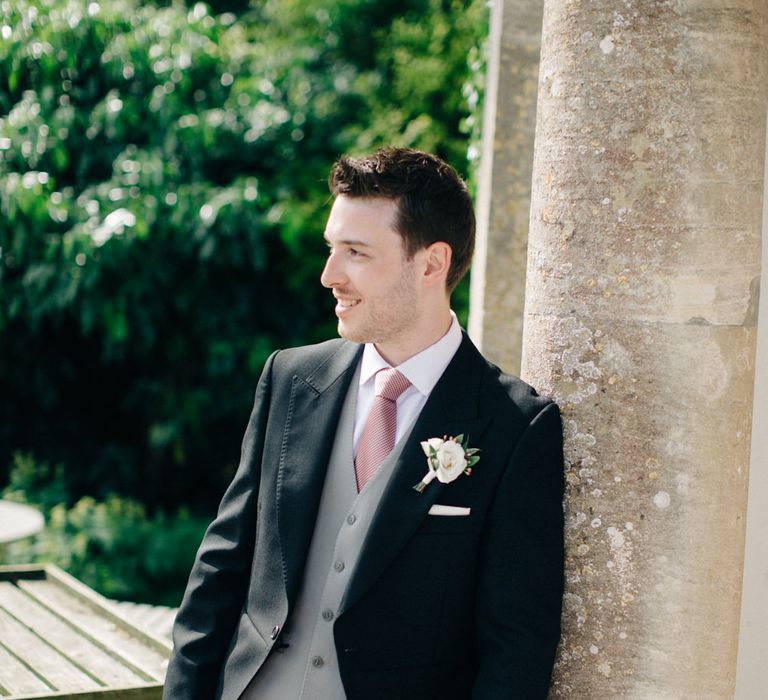 Groom In Grey Waistcoat With Black Jacket From Moss Bros. // Image By M&amp;J Photography