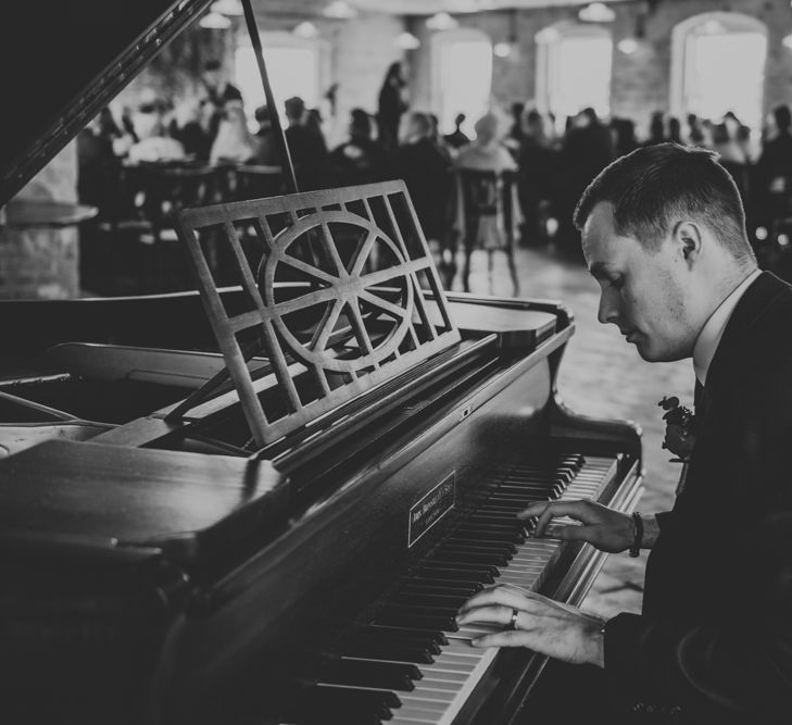 Piano Music | Copper &amp; Greenery Industrial Winter Wedding at The West Mill Derby, Styled by The Vintage House That Could | Rosie Kelly Photography | Jason Lynch Weddings