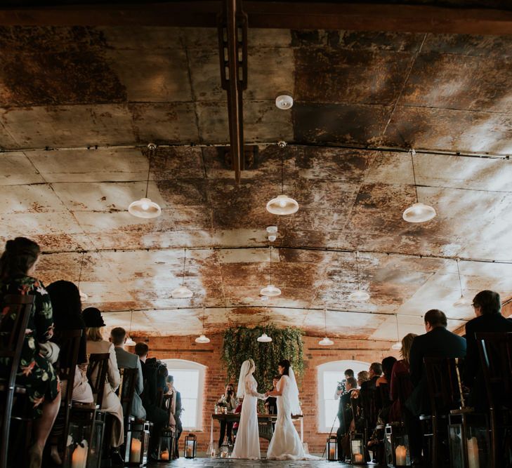 Wedding Ceremony | Brides in Wed2B Lace Bridal Gowns | Copper &amp; Greenery Industrial Winter Wedding at The West Mill Derby, Styled by The Vintage House That Could | Rosie Kelly Photography | Jason Lynch Weddings