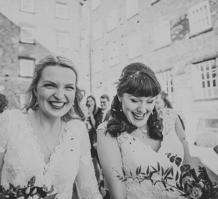 Confetti Exit | Brides in Wed2B Bridal Gowns | Copper &amp; Greenery Industrial Winter Wedding at The West Mill Derby, Styled by The Vintage House That Could | Rosie Kelly Photography | Jason Lynch Weddings