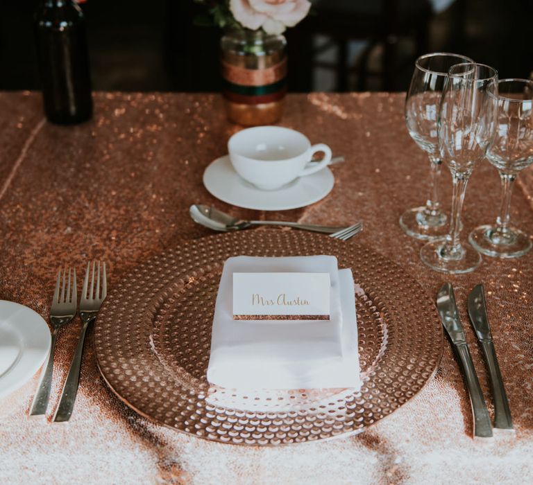 Place Setting with Sequin Table Cloth &amp; Platter | Copper &amp; Greenery Industrial Winter Wedding at The West Mill Derby, Styled by The Vintage House That Could | Rosie Kelly Photography | Jason Lynch Weddings