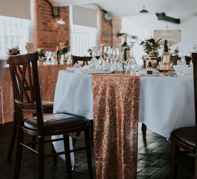 Sequin Table Runner Wedding Decor | Copper &amp; Greenery Industrial Winter Wedding at The West Mill Derby, Styled by The Vintage House That Could | Rosie Kelly Photography | Jason Lynch Weddings