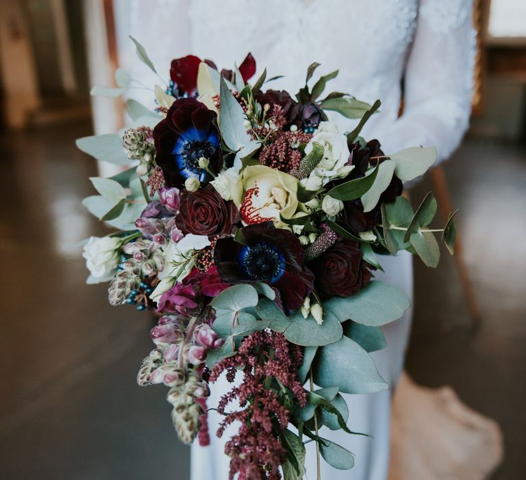 Trailing Winter Bridal Bouquet | Bride in Lace WED2B Bridal Gown | Copper &amp; Greenery Industrial Winter Wedding at The West Mill Derby, Styled by The Vintage House That Could | Rosie Kelly Photography | Jason Lynch Weddings