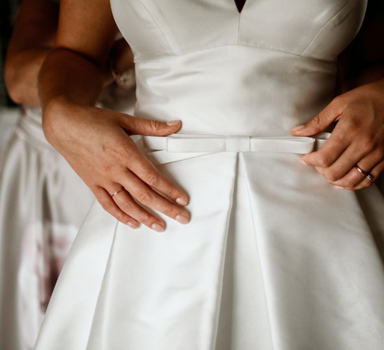 Bow detail on Jesus Peiro wedding dress