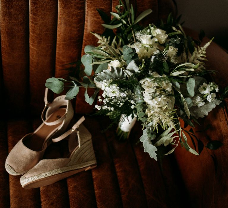 Foliage bouquet and bridal wedges for industrial wedding with cupcake wedding cake