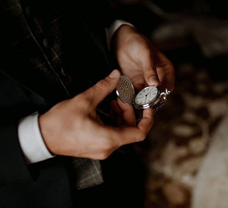 Pocket watch for groom at wedding with cupcake wedding cake