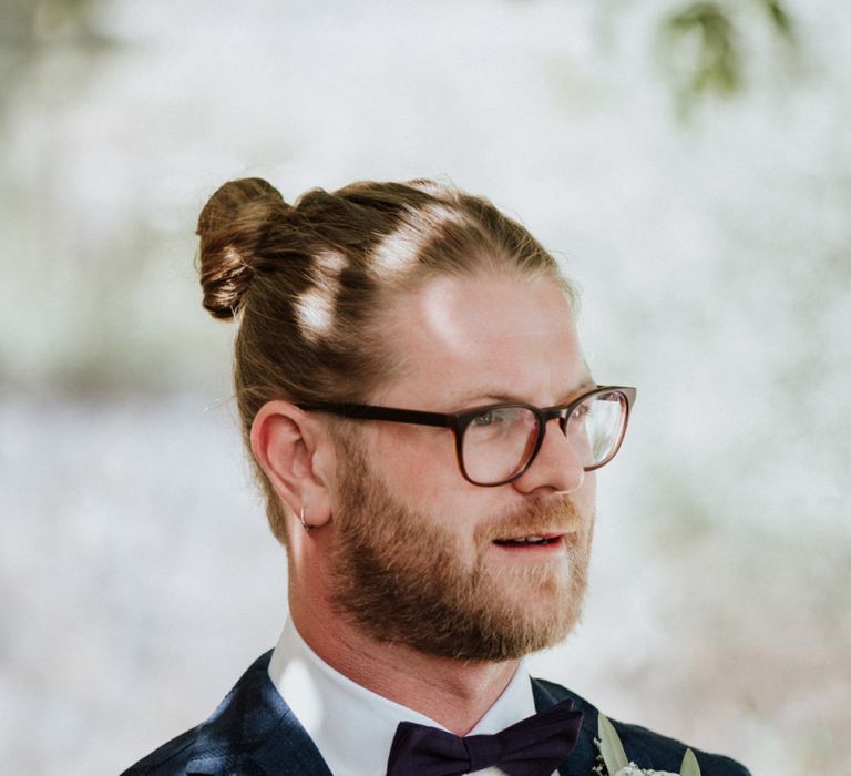 Groom in Blue Check Suit, Bow Tie and Top Knot