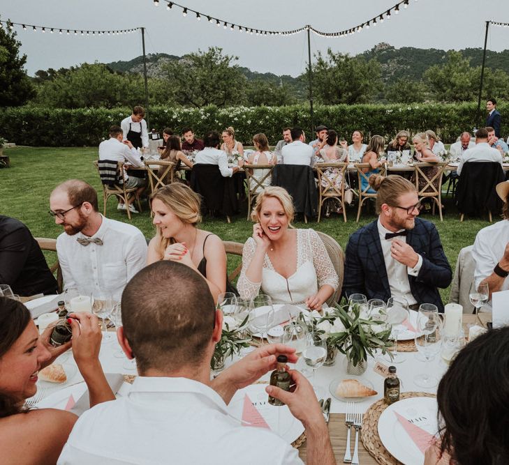 Bride and Groom Enjoying Their Outdoor Wedding Reception