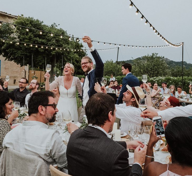 Bride and Groom Toasting During Their Wedding Reception