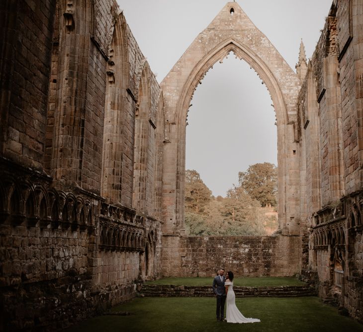 Bride and Groom portrait at Bolton Abbey Priory Ruins