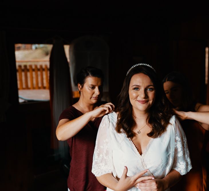 Bride with bridesmaids in Autumn wedding colours