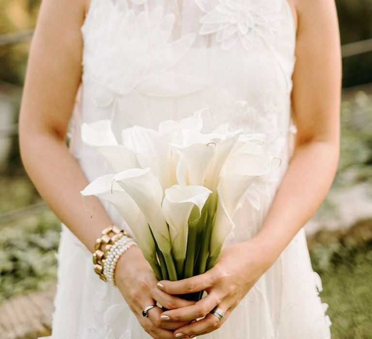 3D flower wedding dress from Viktor &amp; Rolf with Calla Lily bouquet