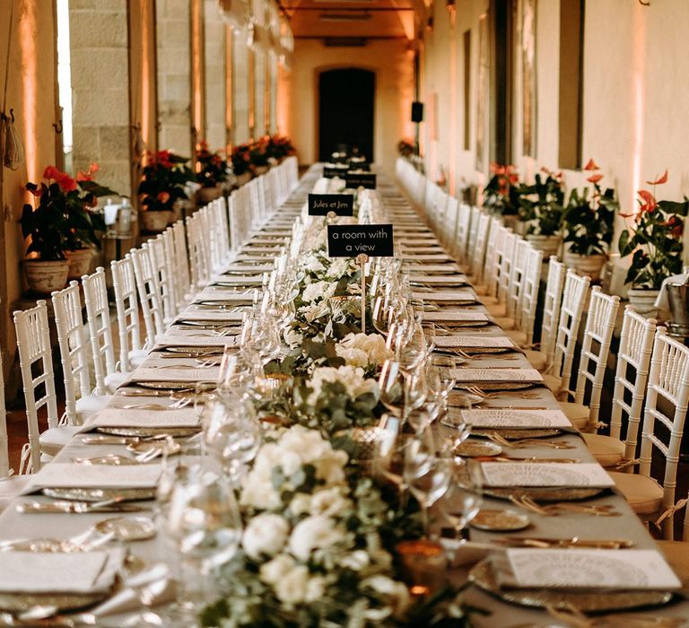 White flowers and foliage wedding table decor