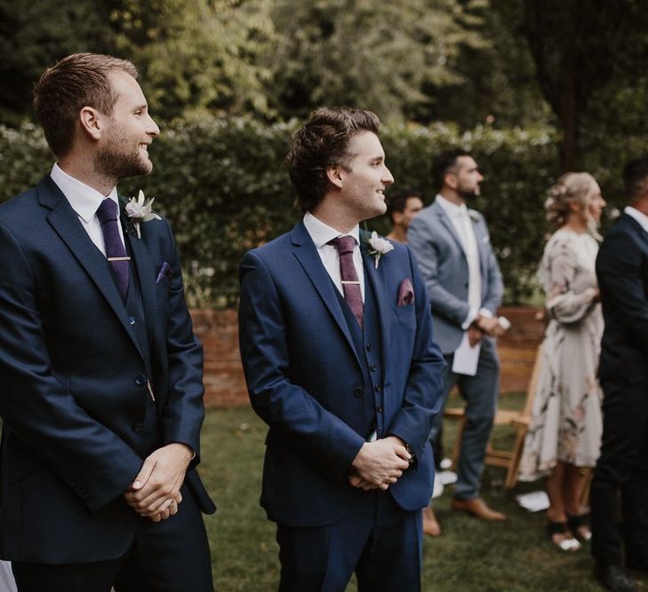 Groom and Groomsmen During Ceremony