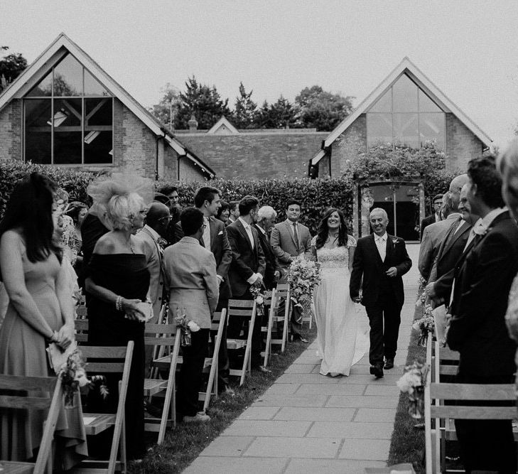 Bride and Father of The Bride Walking Down the Aisle