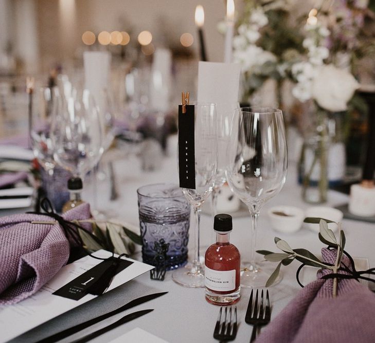 Wedding Table Setting Detail with Gin Wedding Favour and Foliage Details and Candles