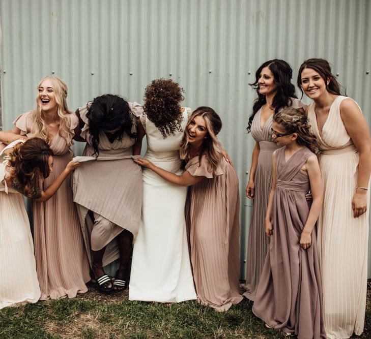 Bridesmaids In Neutral Dresses // Caribbean Influenced Wedding Kingsthorpe Lodge Barn With Steel Band And Bride In Maggie Sottero Images From Ania Ames Photography