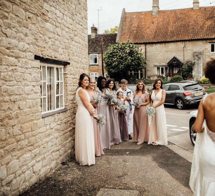 Bridesmaids In Dusky Pink Dresses // Caribbean Influenced Wedding Kingsthorpe Lodge Barn With Steel Band And Bride In Maggie Sottero Images From Ania Ames Photography