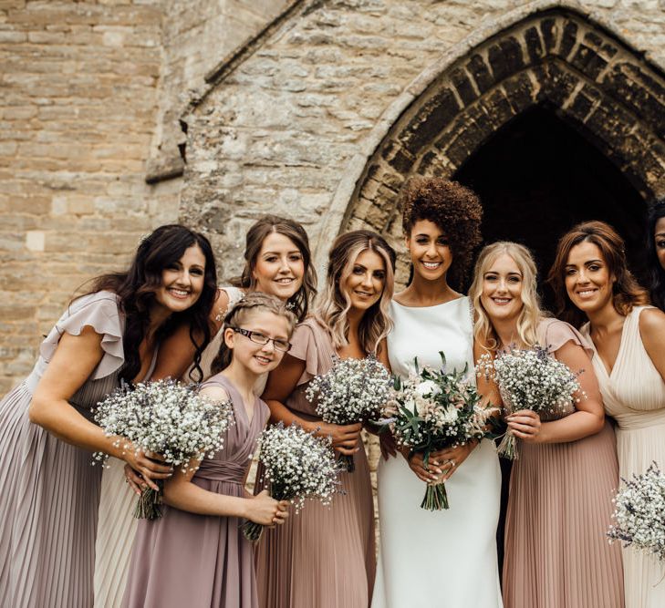 Bridesmaids In Neutral Toned Dresses // Caribbean Influenced Wedding Kingsthorpe Lodge Barn With Steel Band And Bride In Maggie Sottero Images From Ania Ames Photography