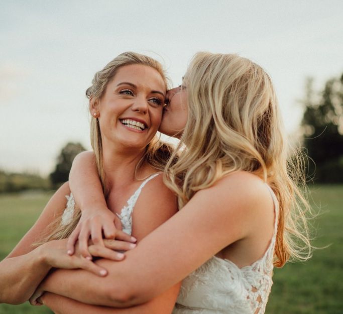 Brides take a moment during wedding day