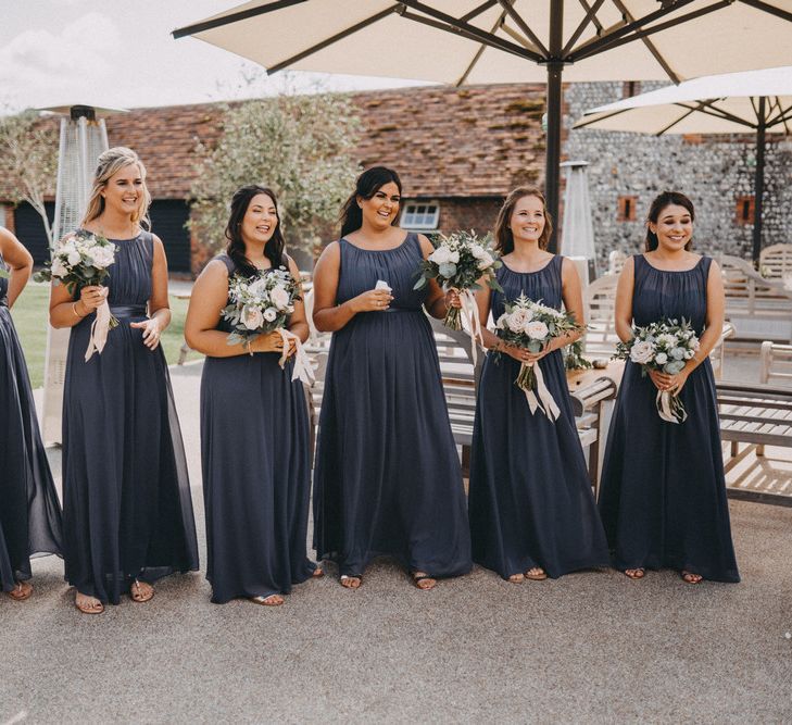 Grey bridesmaid dresses at Farbridge wedding venue