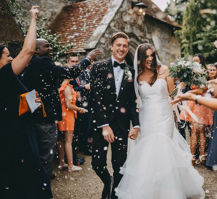 Confetti exit for bride and groom