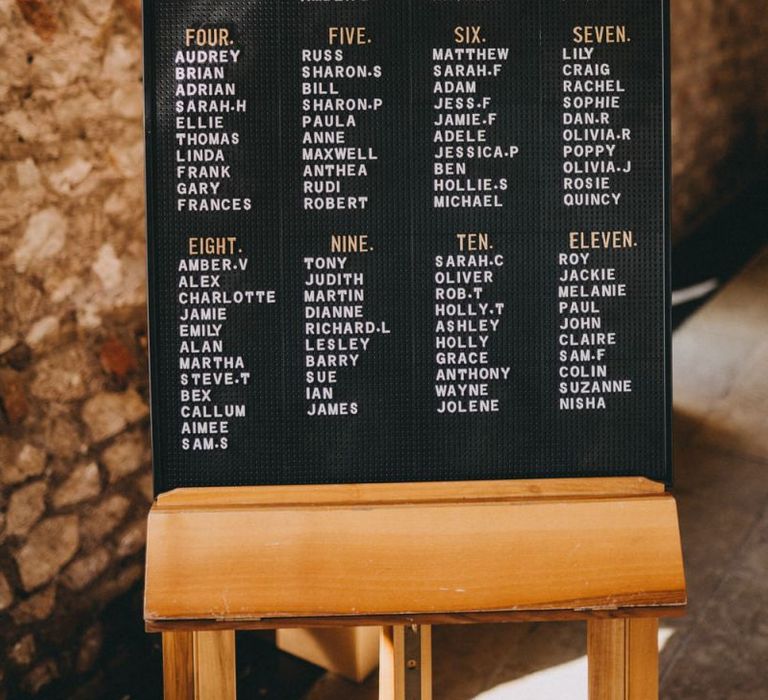 Peg board seating chart at Farbridge wedding venue