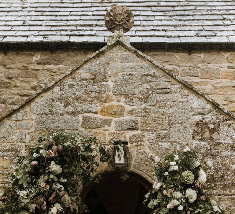 Church Entrance Surrounded with Floral Decor