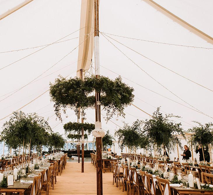 Tent Wedding With Foliage Table Decor and Hanging Decoration