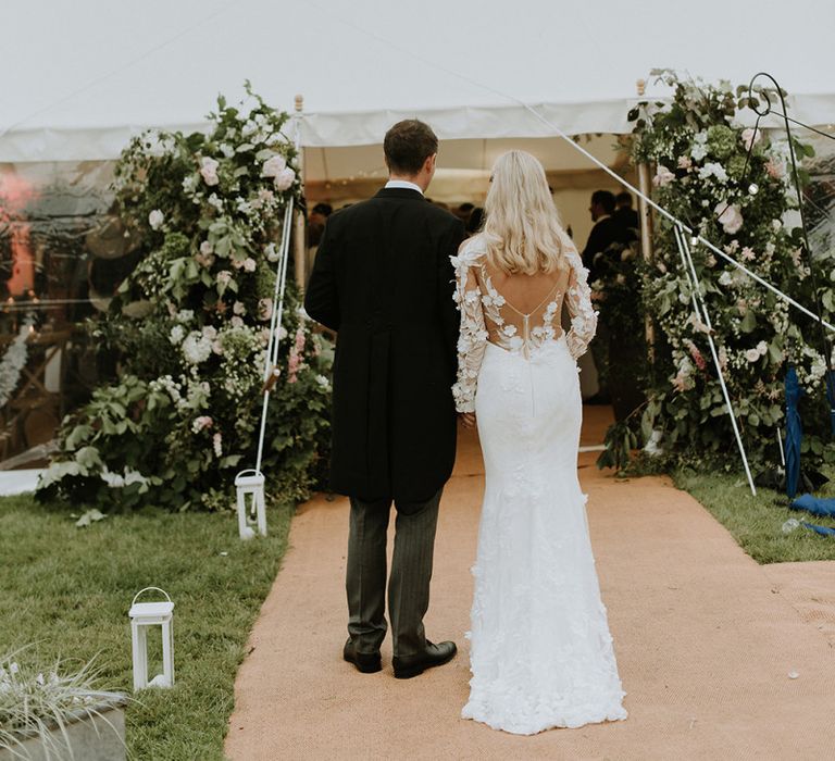 Bride and Groom Entering Reception Tent