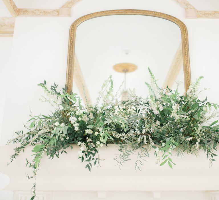 White and Green Mantel Piece Wedding Flowers