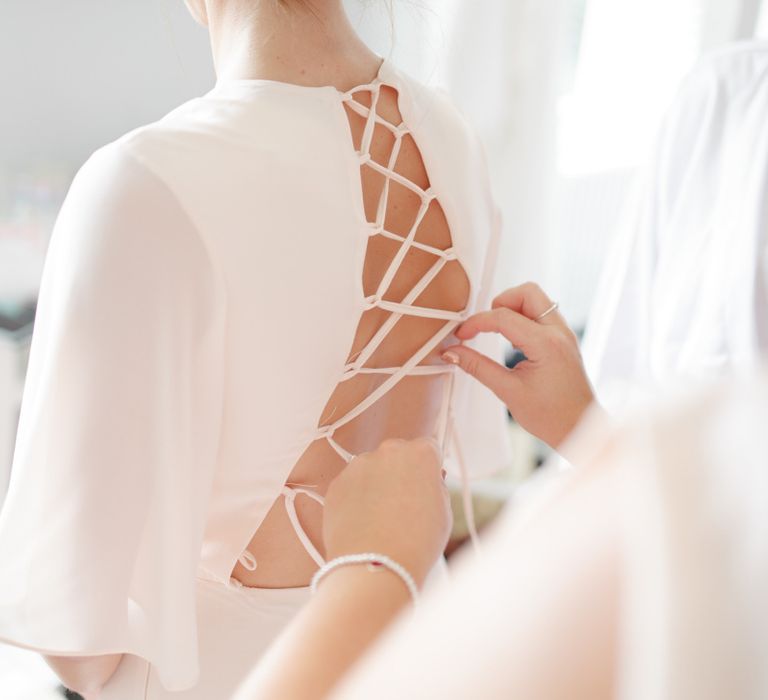 Bridesmaid in Pink TFNC Dress with Lace up Back Detail