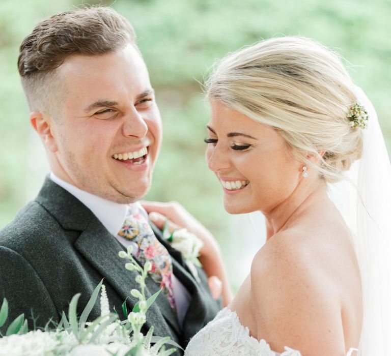 Intimate Picture of Bride and Groom Laughing and Embracing