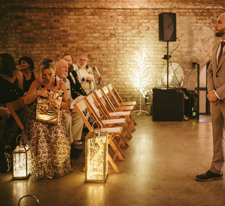 Wedding Ceremony | Groom in Grey Puppy Tooth Check Two-Piece Paul Smith Suit with Amber Tie Pin, Pocket Square and Braces | Bike Shed Motorcycle Club Wedding for ELLE Digital Editor | Nigel John Photography