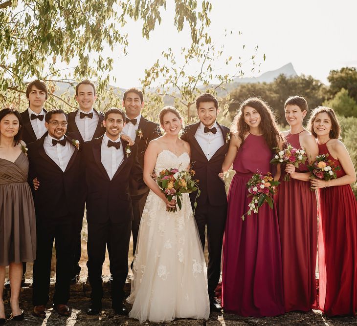 Wedding Party | Bride in Ellis Bridal Tulle &amp; Embroidery Bridal Gown | Bridesmaids in Red JJHouse Dresses | Groomsmen in Black Tie Suits | South of France Wedding | Andy Gaines Photography | Thompson Granger Films