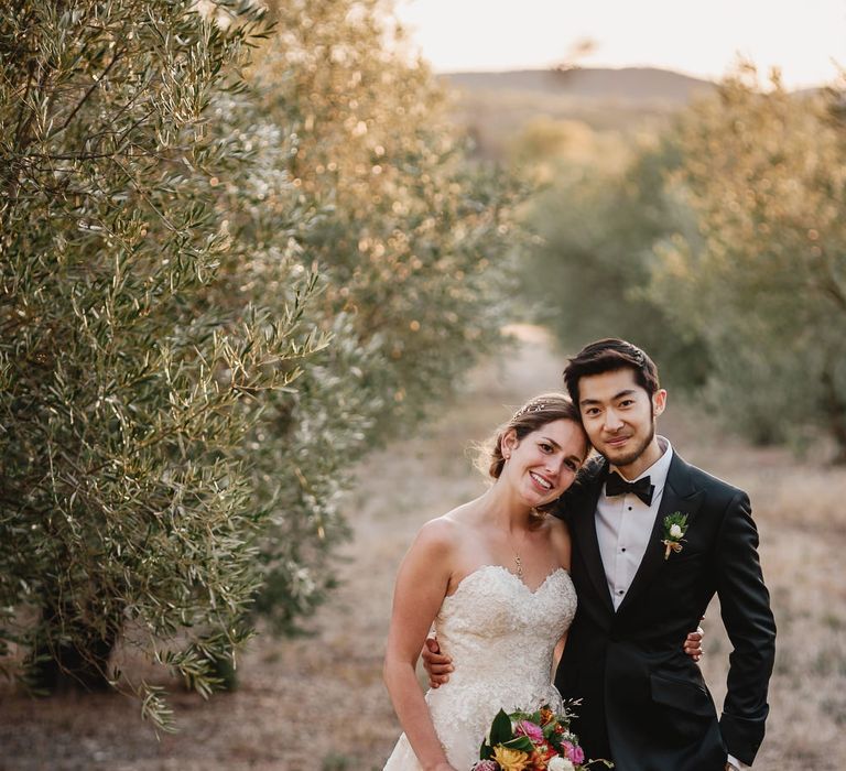 Bride in Ellis Bridal Tulle &amp; Embroidery Bridal Gown | Groom in Black Tie Suit | South of France Wedding | Andy Gaines Photography | Thompson Granger Films