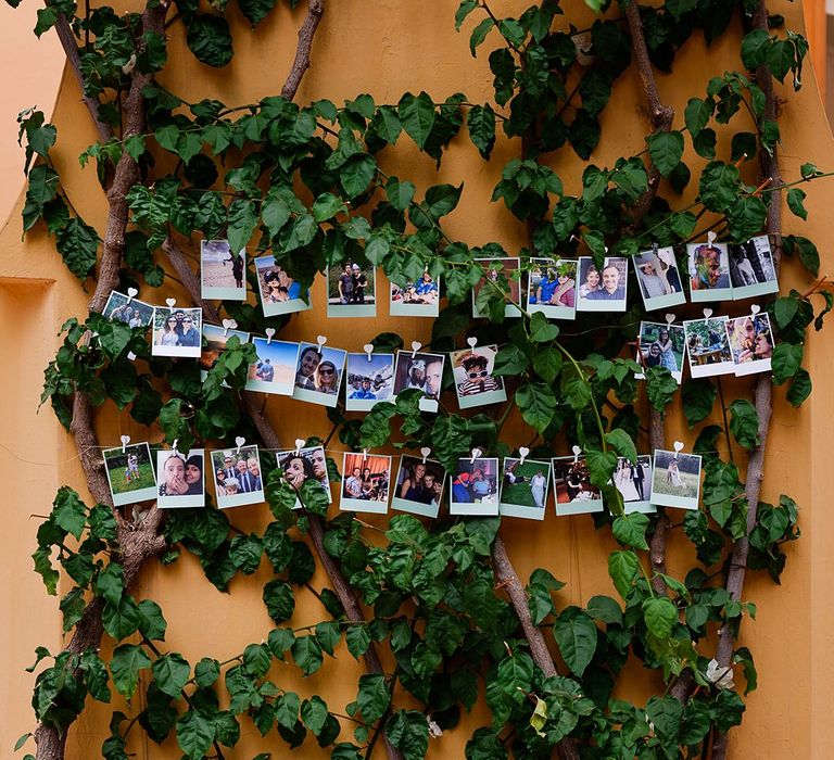 Polaroid Picture Wedding Decor | Paradise Destination Wedding at Jnane Tamsna in Marrakech, Morocco | Nordica Photography | Matteo Castelluccia Film