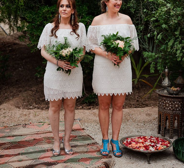 Outdoor Wedding Ceremony | Bridesmaids in White Vero Moda Dresses |  Paradise Destination Wedding at Jnane Tamsna in Marrakech, Morocco | Nordica Photography | Matteo Castelluccia Film