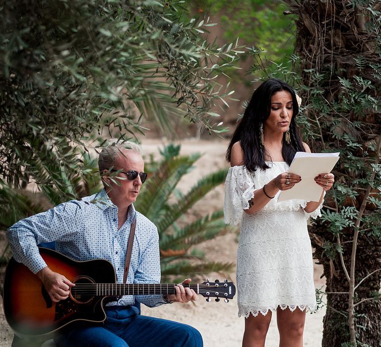 Outdoor Wedding Ceremony | Bridesmaid in White Vero Moda Dress |  Paradise Destination Wedding at Jnane Tamsna in Marrakech, Morocco | Nordica Photography | Matteo Castelluccia Film