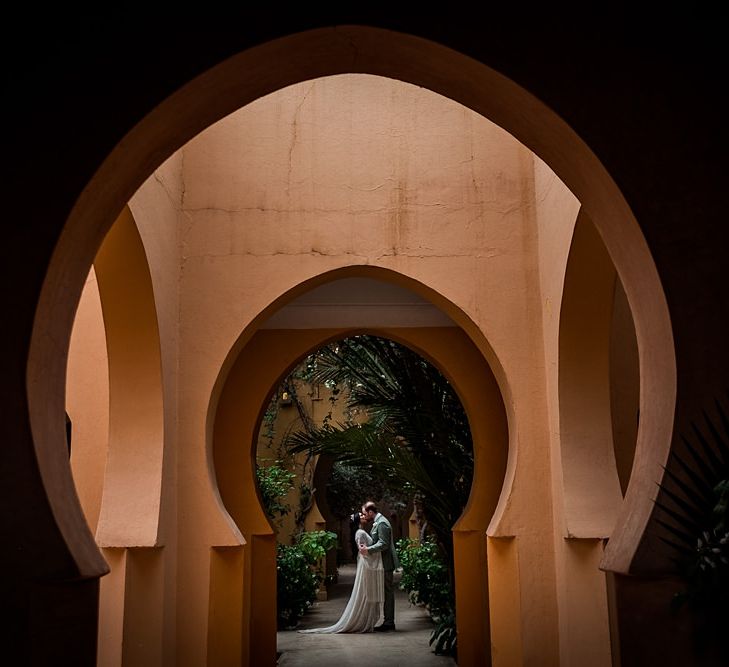 Bride in rue de Seine Bridal Gown | Groom in Green Beggars Run Suit | Paradise Destination Wedding at Jnane Tamsna in Marrakech, Morocco | Nordica Photography | Matteo Castelluccia Film