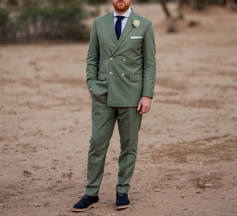 Groom in Green Beggars Run Suit | Paradise Destination Wedding at Jnane Tamsna in Marrakech, Morocco | Nordica Photography | Matteo Castelluccia Film